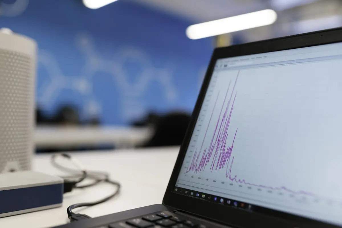 Laptop showing process analytics charts